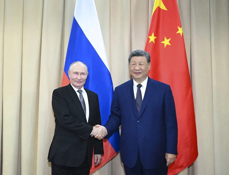 习近平会见俄罗斯总统普京.jpg